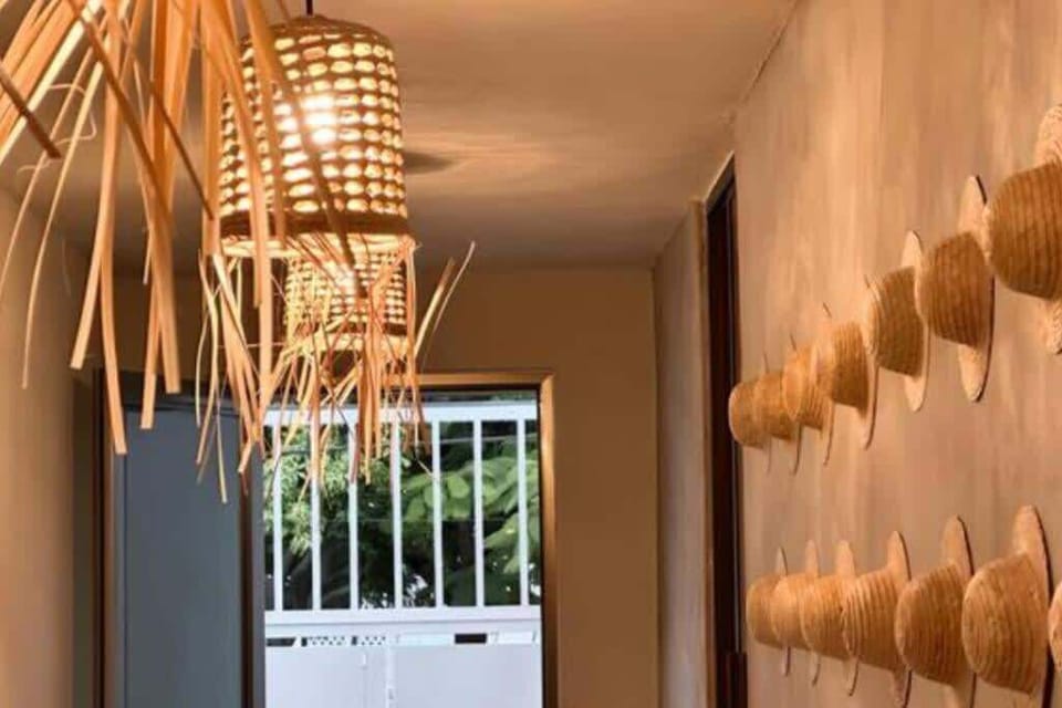 Entry with wood-slat detail and storage
