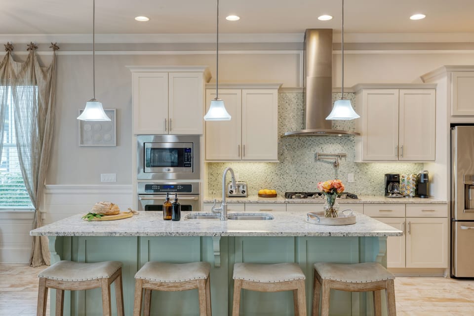 Barstool seating at the kitchen island.