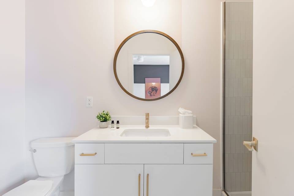 Bedroom 1's ensuite bathroom features a walk-in shower.