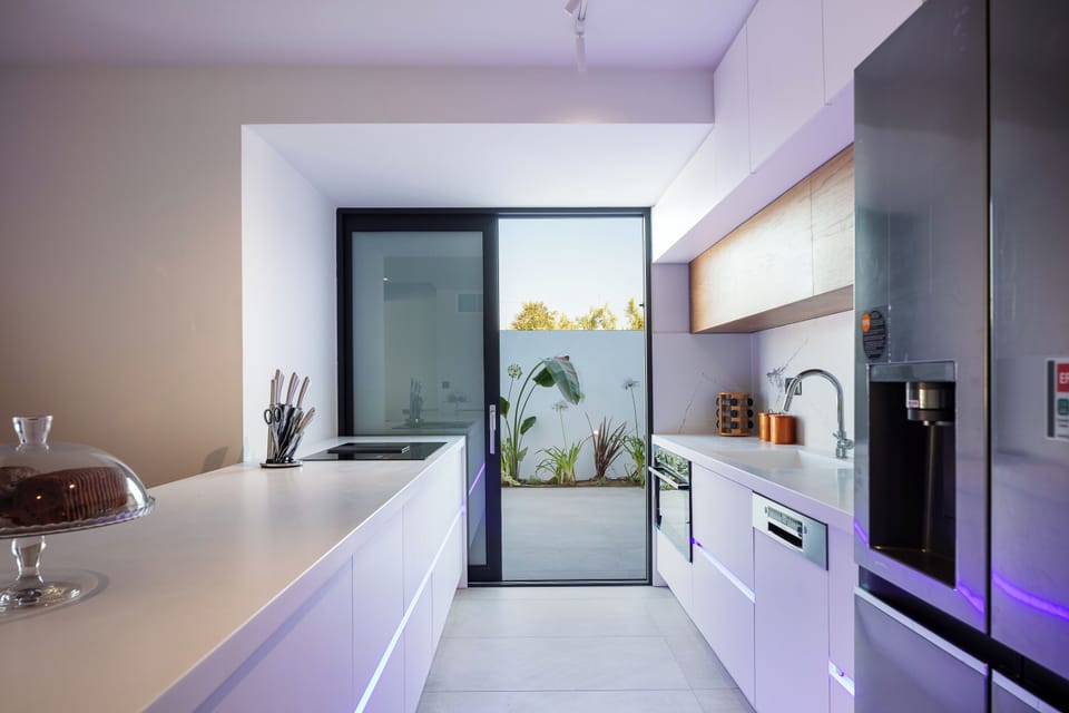 The kitchen is fully equipped with state-of-the-art appliances, ensuring that preparing meals feels like a delightful breeze.