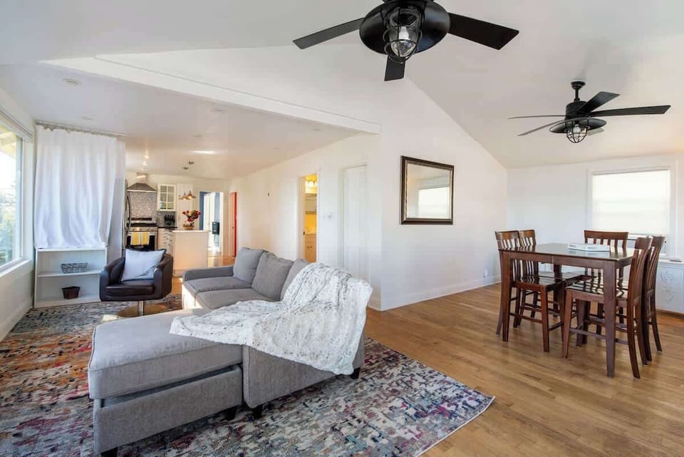 Open living and dining area with comfortable seating and plenty of space to relax or gather.
