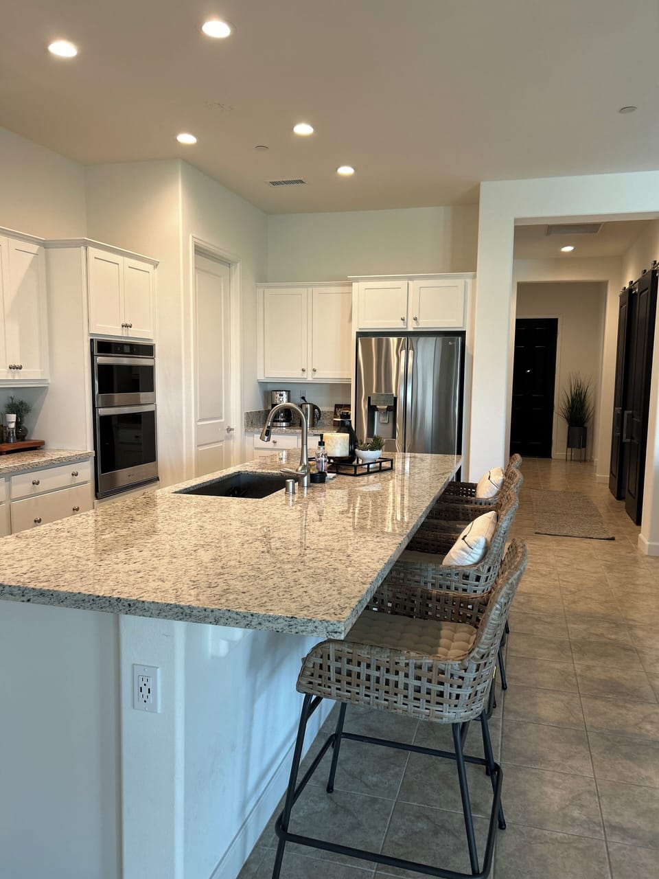 Large open kitchen with 4 barstools