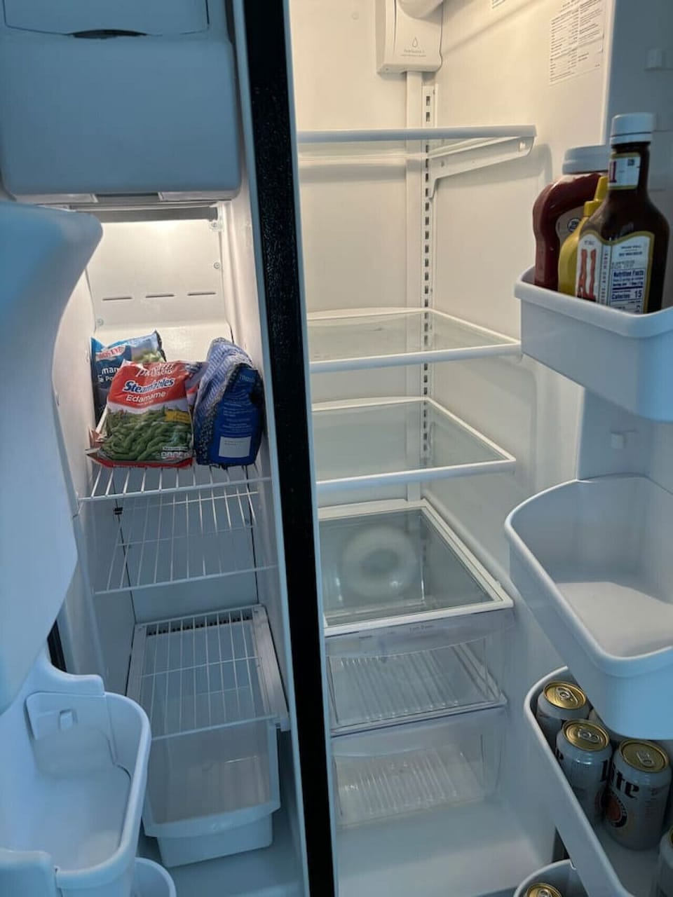 Refrigerator with ice maker and filtered water dispenser