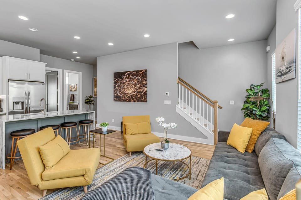 2nd Floor: Bright and Open Living Area featuring a Smart TV and designer furnishings
