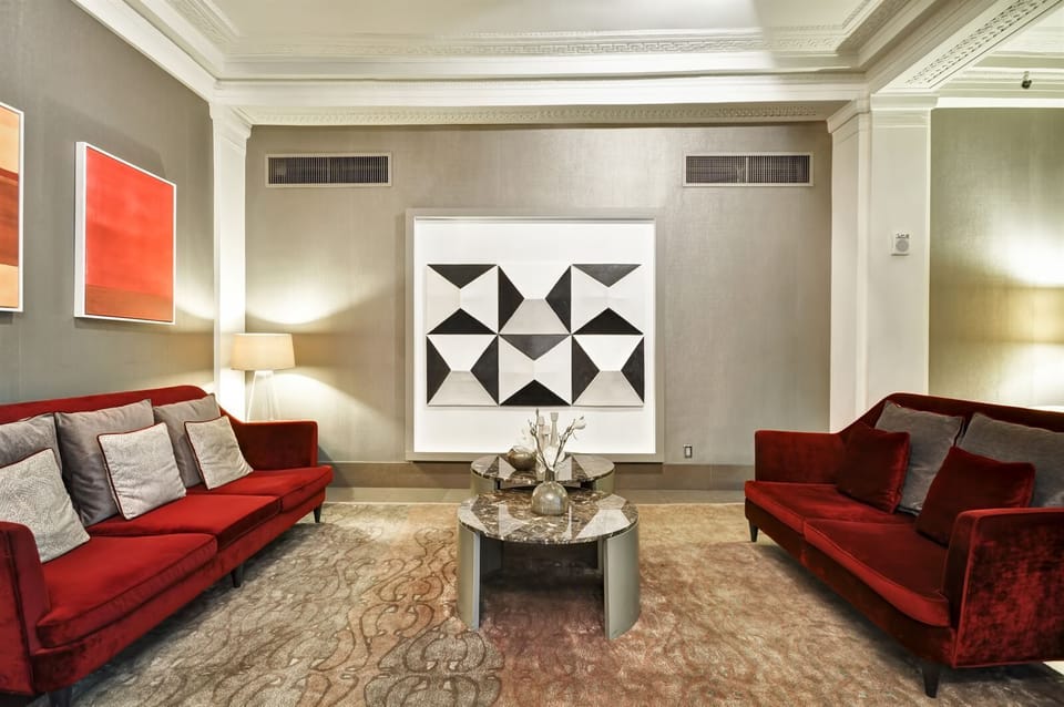 Linger on velvet seating in a stylish, quiet lounge.