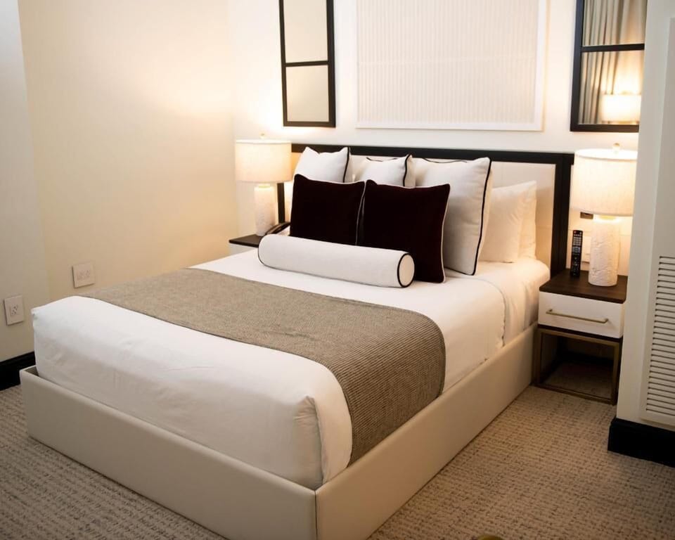 Recharge in a serene room with boutique-hotel comfort.