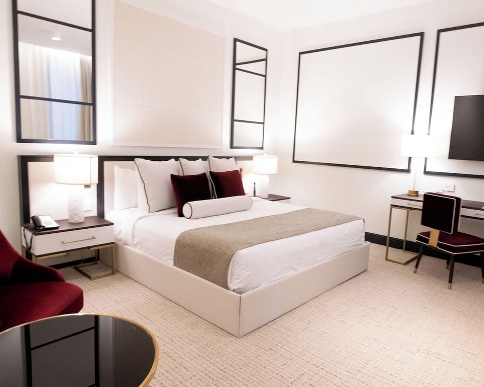 Settle into a serene retreat with chic workspace and glow.