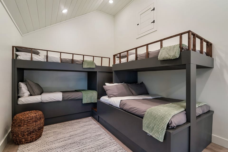 Family-friendly bunk room — perfect for kids, teens & extra sleeping capacity.