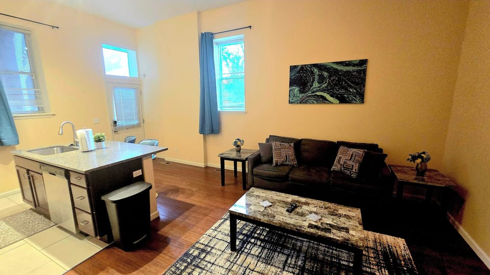 The cozy living room is designed for relaxation and entertainment.
