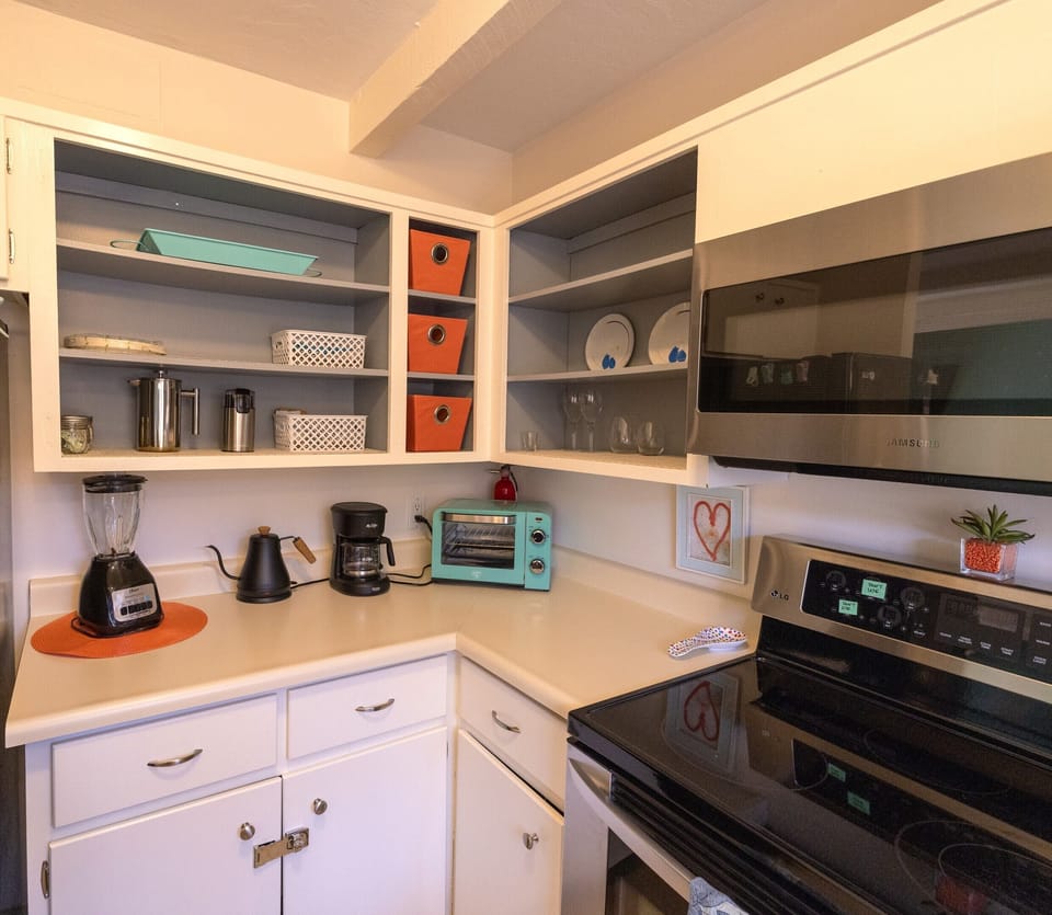 Fully stocked and full-sized kitchen.