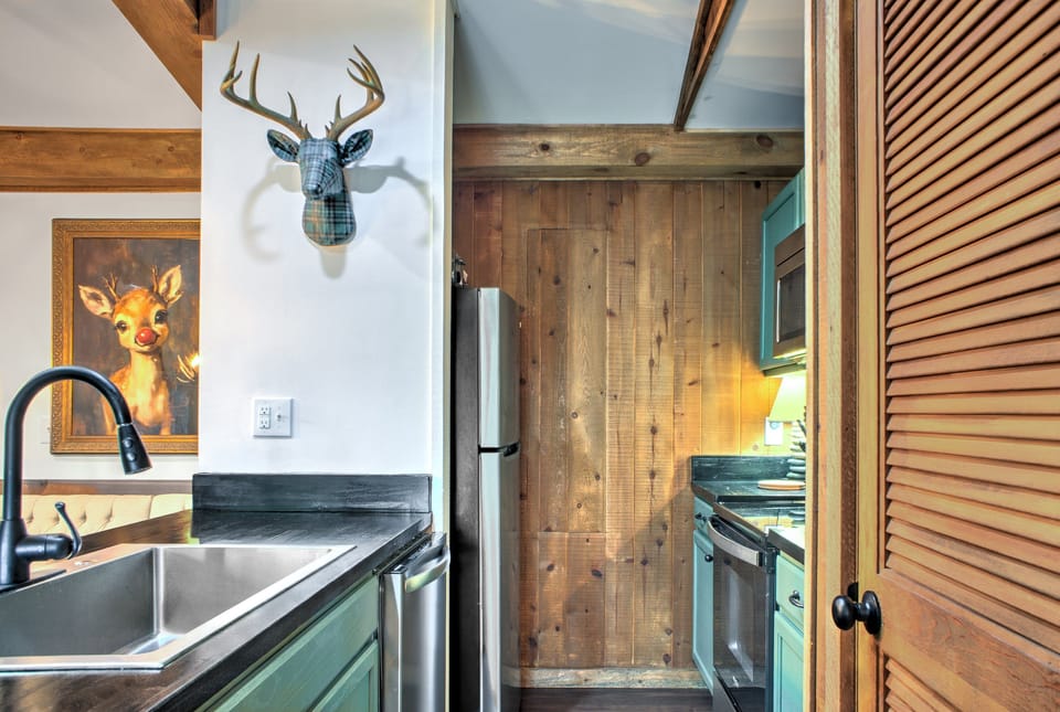 Kitchen is outfitted with an Electric Range