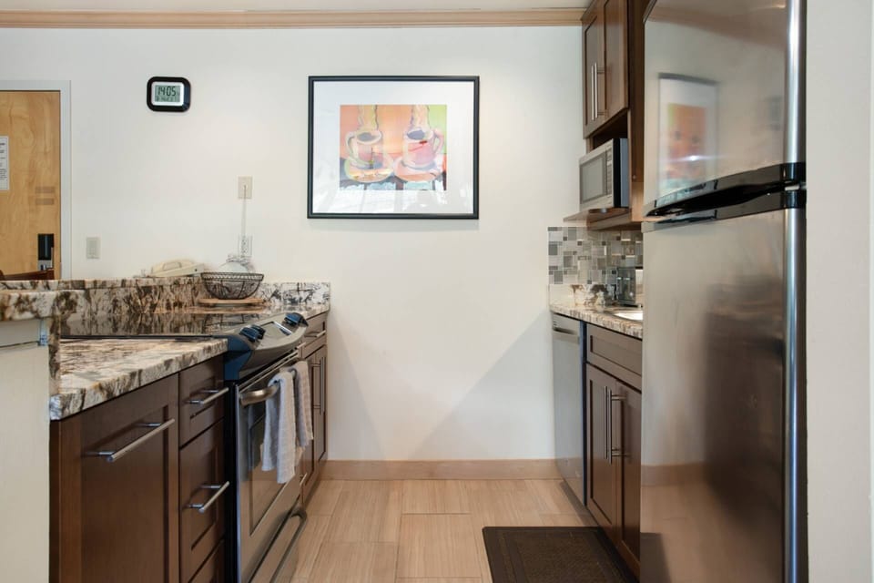 Kitchen Stocked with Drip Coffee Maker, Toaster, Crock Pot and Panini Press.