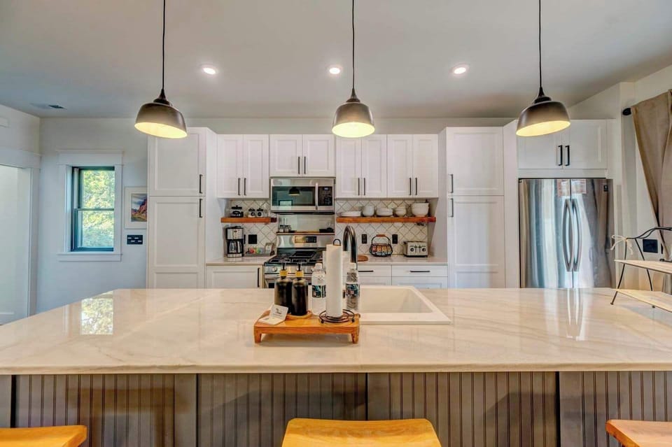 A spacious island perfect for meal prep or casual dining.