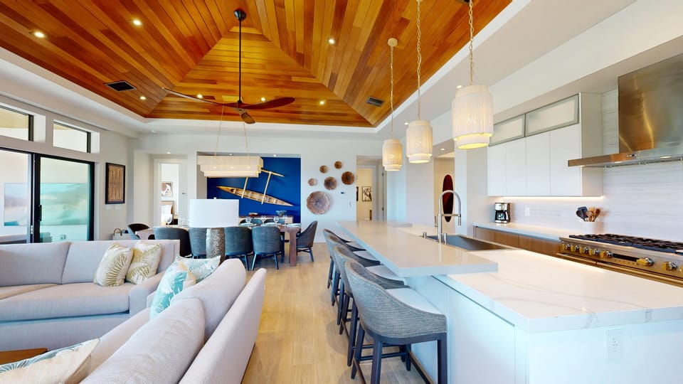 Open concept great room with gorgeous vaulted ceilings