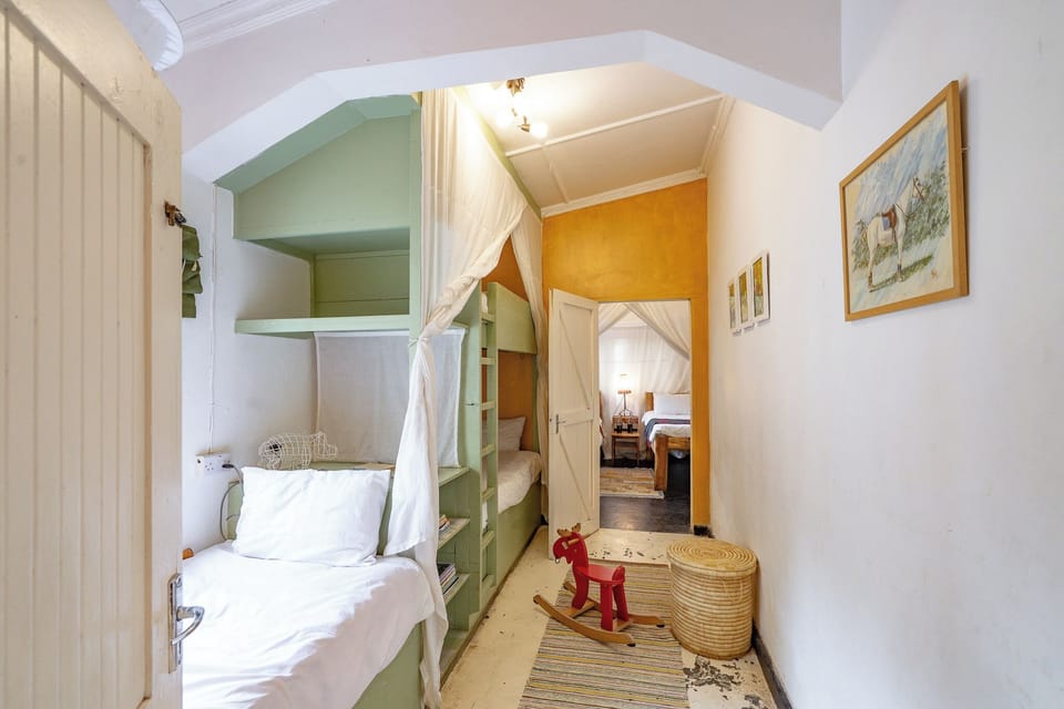 Kids bunk room door to 4th bedroom behind