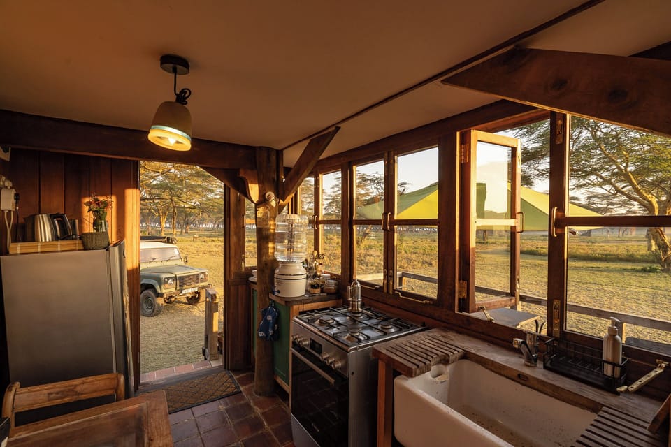 kitchen, front door behind and parking beyond