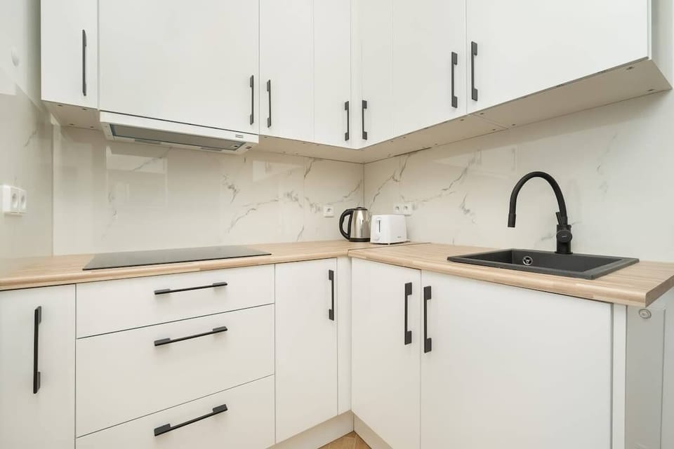 The kitchenette's practical layout maximizes space and functionality.