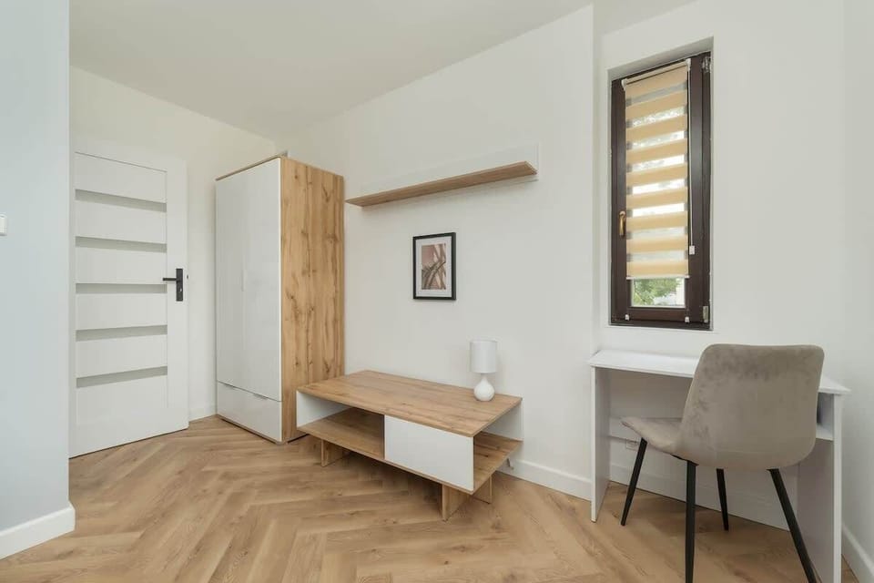  The bedrooms' modern amenities ensure a comfortable stay. 