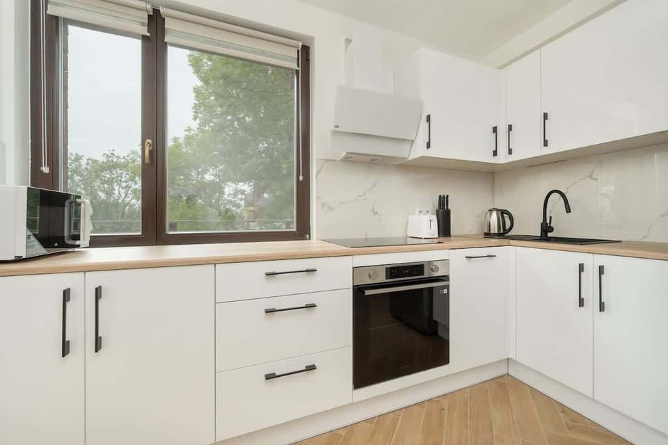 The fully equipped kitchenette includes everything you need for a home-cooked meal.