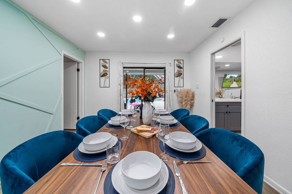 Enjoy family meals around the formal dining table with seating for eight. This inviting space is perfect for holiday dinners, celebrations, or everyday gatherings, making your Florida vacation rental feel like a true home away from home. #LargeGroup