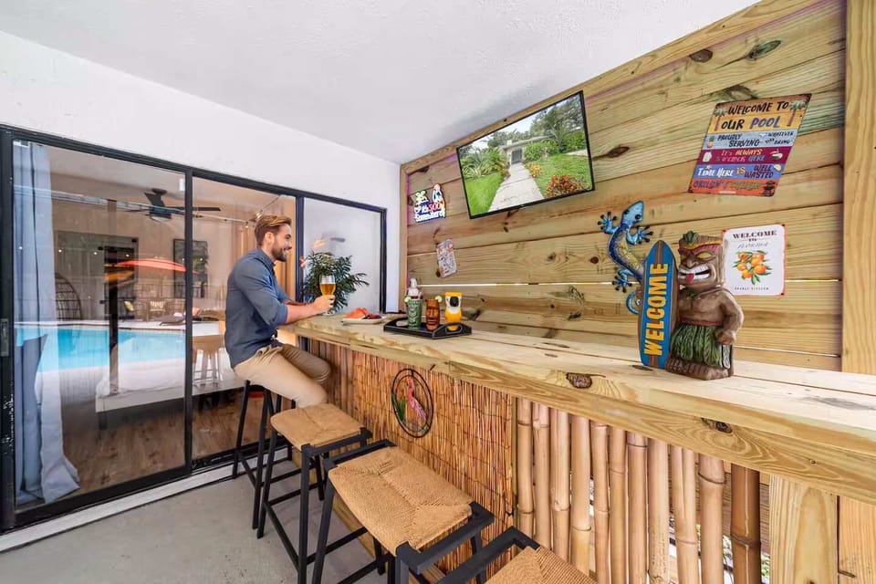 Enjoy watching the game at the tiki bar!