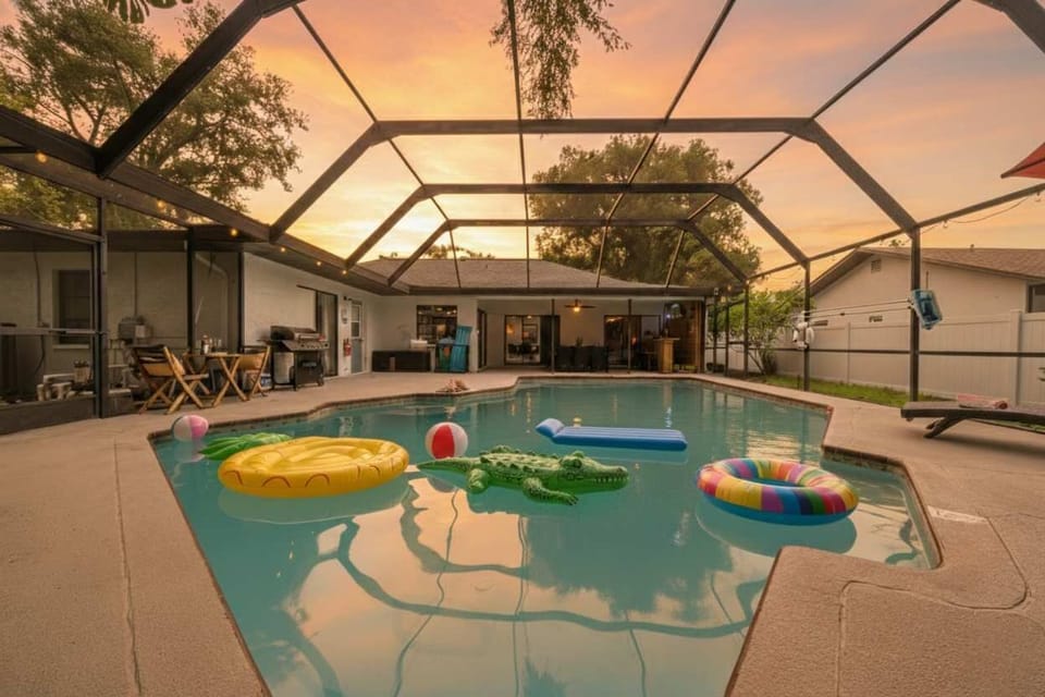 Dive into family fun in your own private heated pool! With toys, floats, and plenty of space to relax under the screened lanai, this Largo, Florida vacation home is perfect for creating stress-free memories together. #FamilyVacation #FloridaGetaway