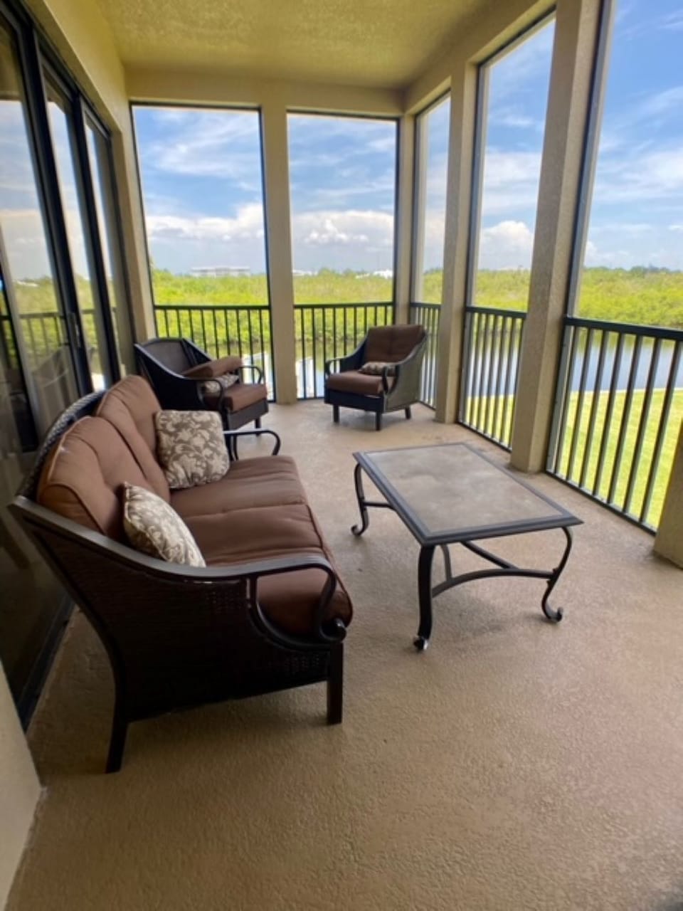Screened lanai with view of the canal