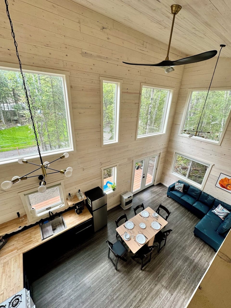 Gather comfortably in this large cabin with a full kitchen, spacious living room, and dining table for six.