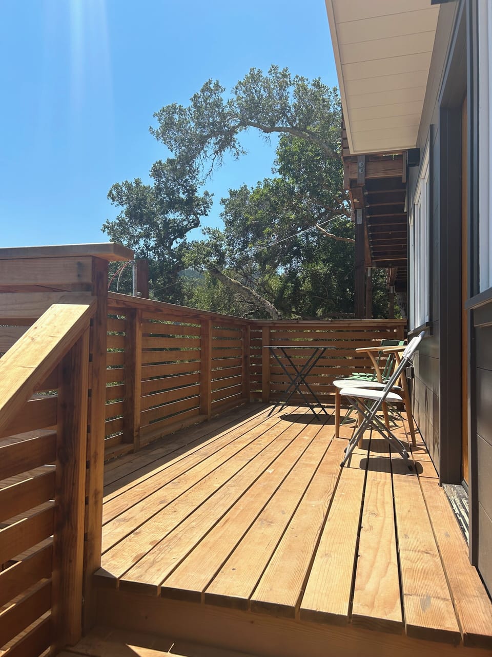 Private deck with breakfast table and 3 chairs. 