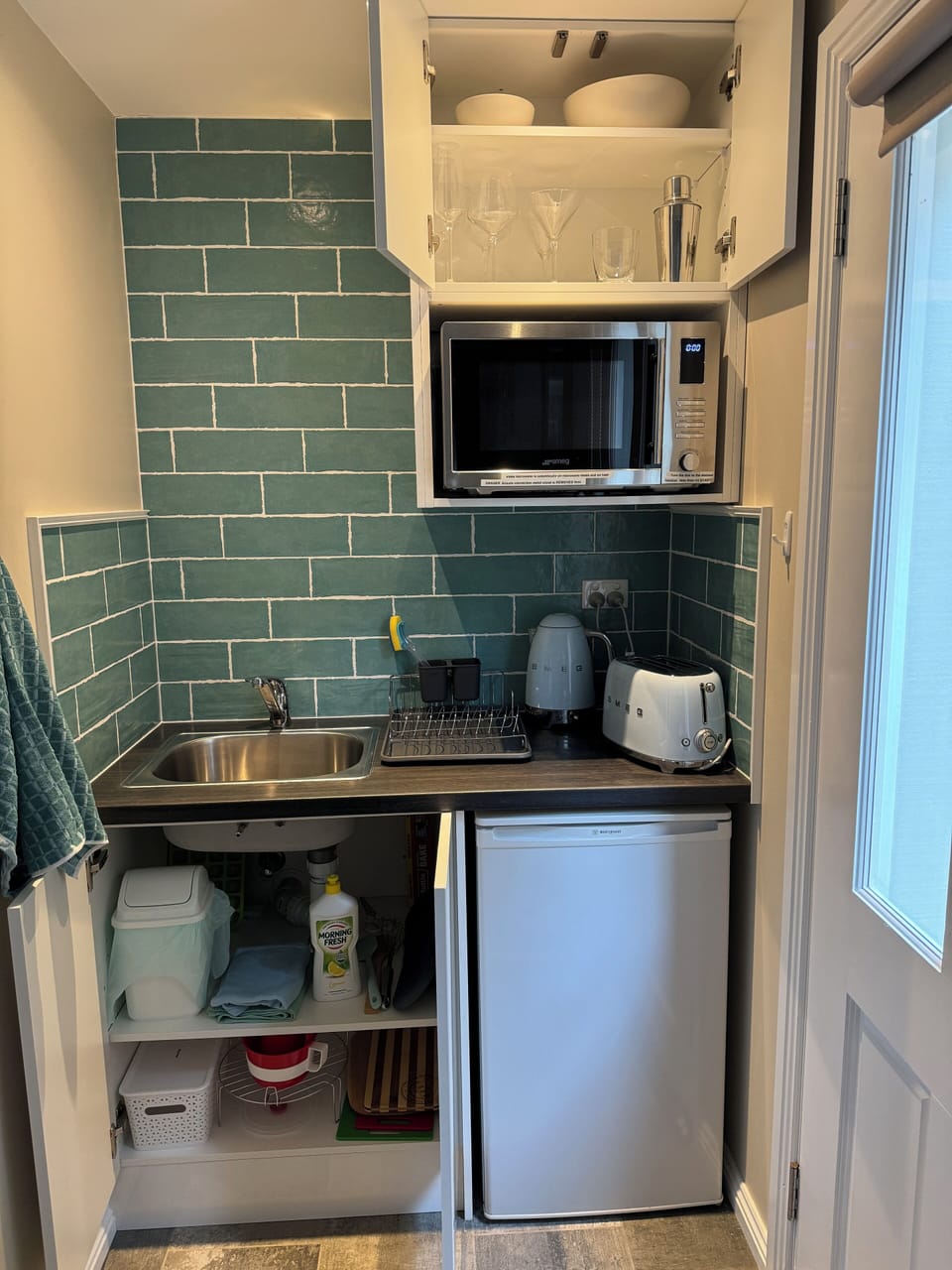 Downstairs kitchen in Beachside studio suite