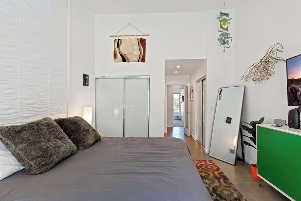 Relax in comfort in the primary king suite, offering high-end linens & pillows