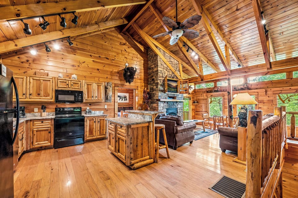 Step into your luxury cabin surrounded by beautiful wood work & custom design!