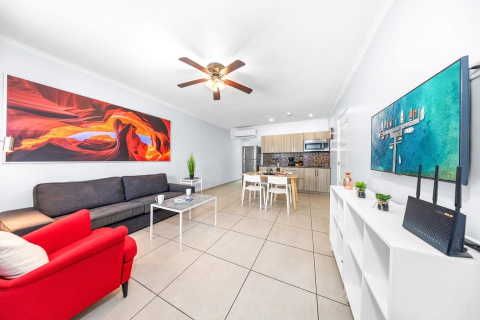 Elevate your everyday in our bright, spacious living room. Its perfect blend of style and comfort creates the ideal setting for relaxation and entertaining. Discover the heart of your new home.