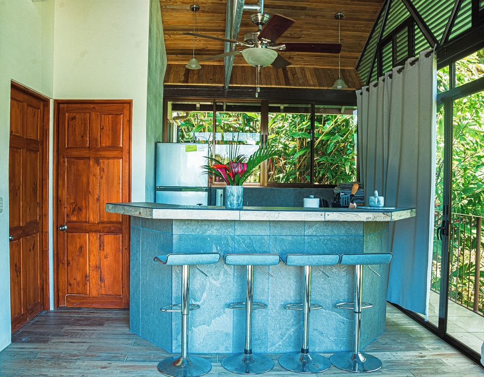 Fully stocked kitchen with bar seating