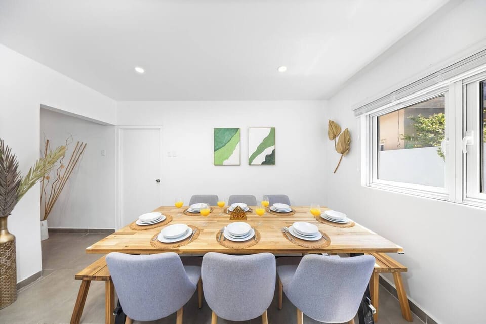 Dine in style: Enjoy delicious meals and great company at our spacious dining table with seating for 8.
