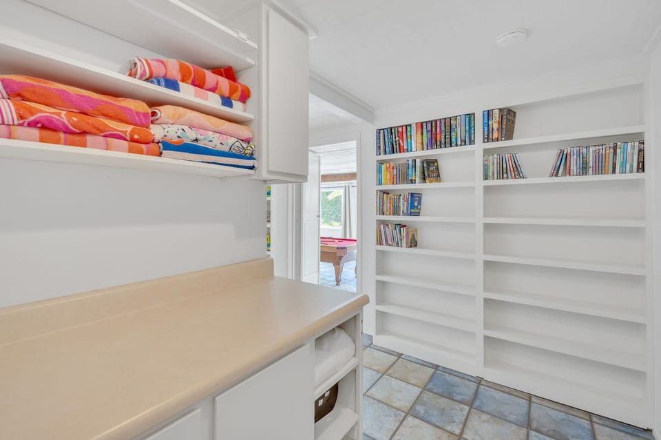 Enjoy a wide selection of books and board games in the downstairs area, perfect for family entertainment, game nights, or relaxing indoor activities.