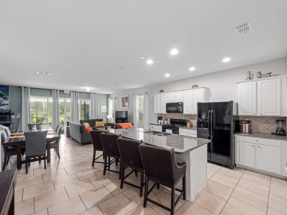 Gorgeous Kitchen with Basic Starter Essentials and Bar Stool Seating