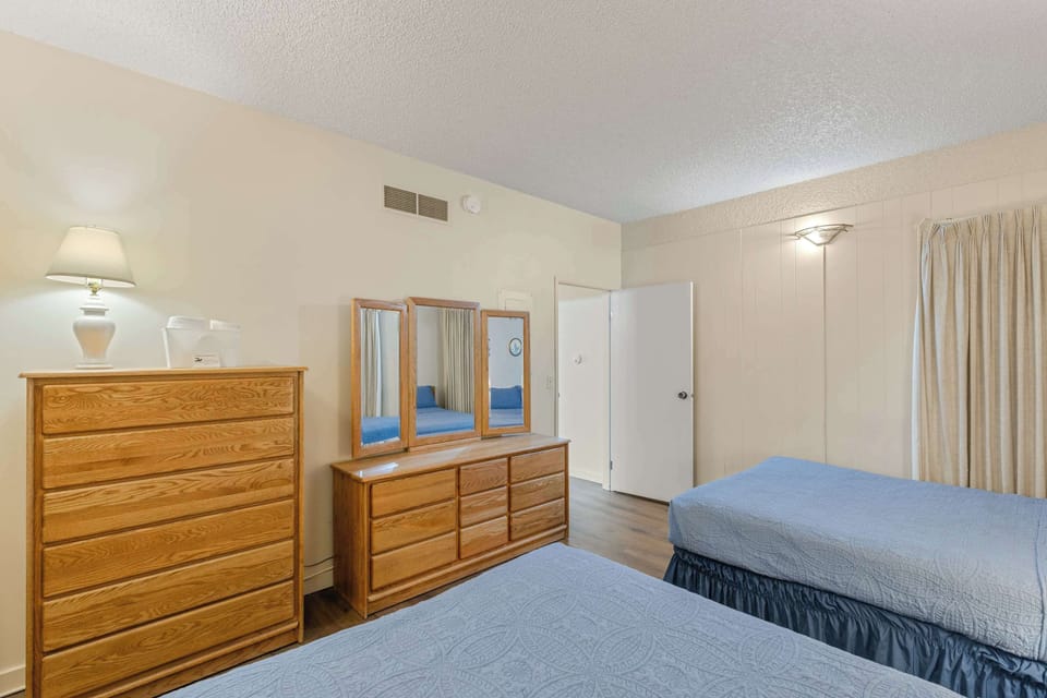 Soft bedding and spacious surroundings create a relaxing atmosphere.
