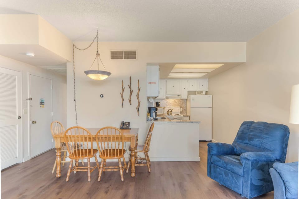 Open kitchen layout keeps everyone connected while cooking.
