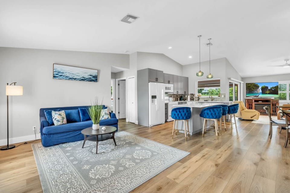 The living room has a sofa to relax on