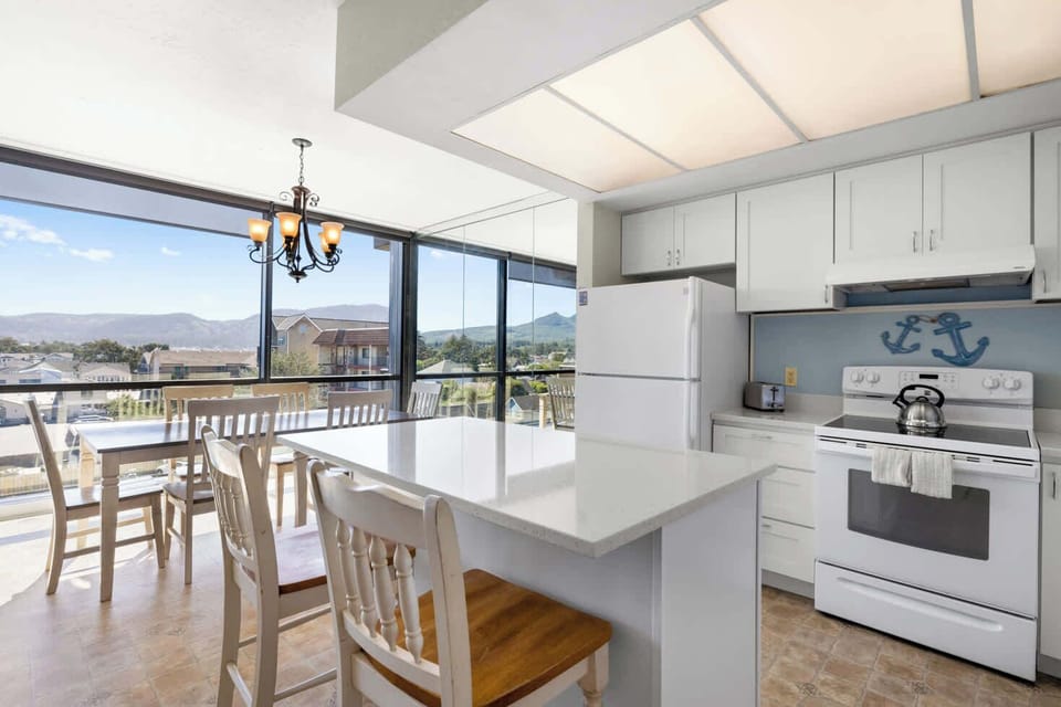 Functional kitchen providing essential appliances creating a clean and practical cooking space.