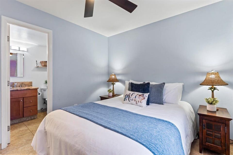 Primary bedroom with en-suite bathroom and AC