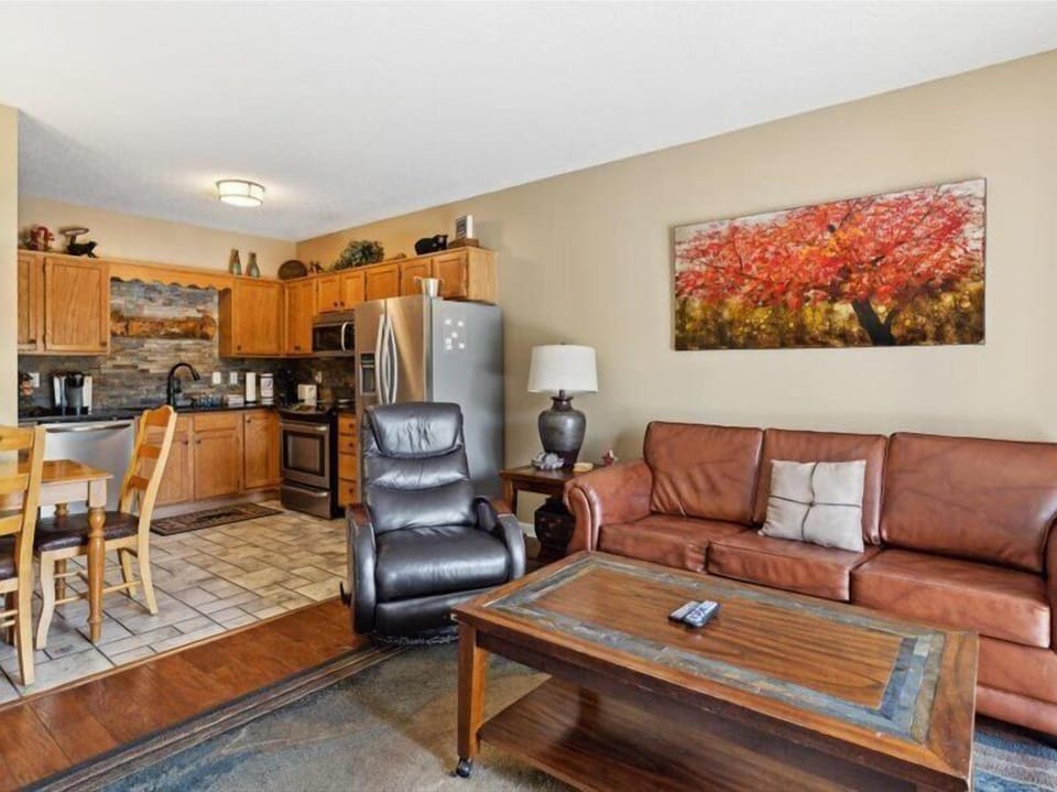 Spacious Living Room with Gas Fireplace, Sleeper Sofa and SMART TV with Cable & WIFI throughout vacation rental