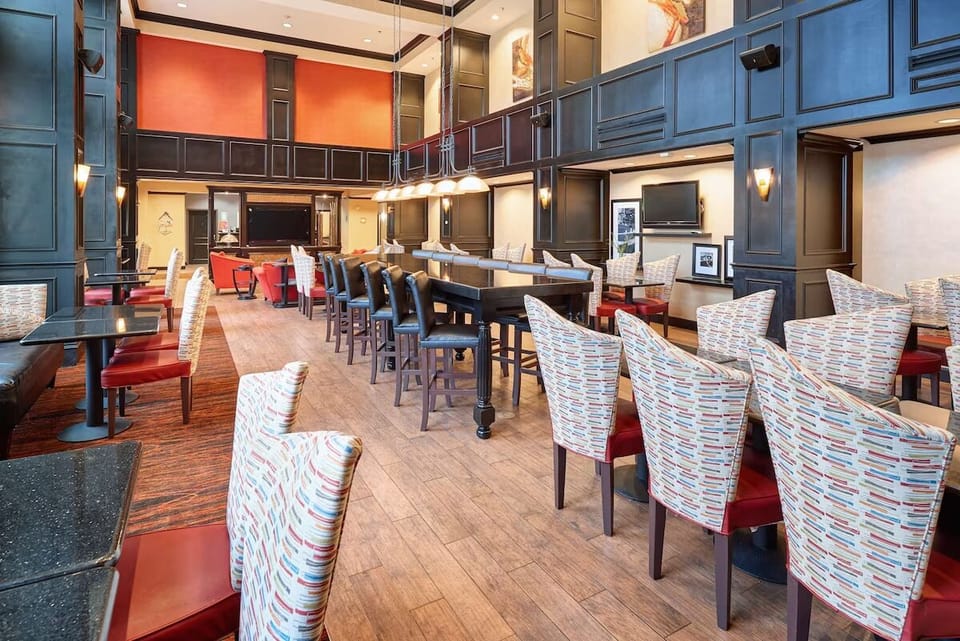 Gather under soaring ceilings for cocktails and conversation.
