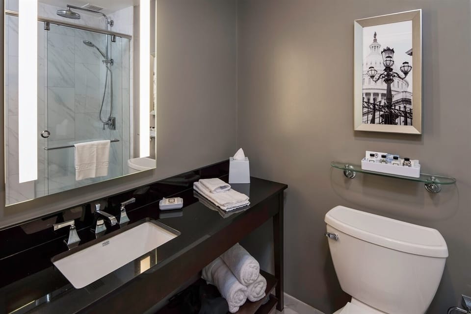 Get ready comfortably with bright lighting and generous counter space.