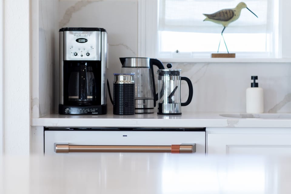 Kitchen with Keurig, coffee maker and tea kettle