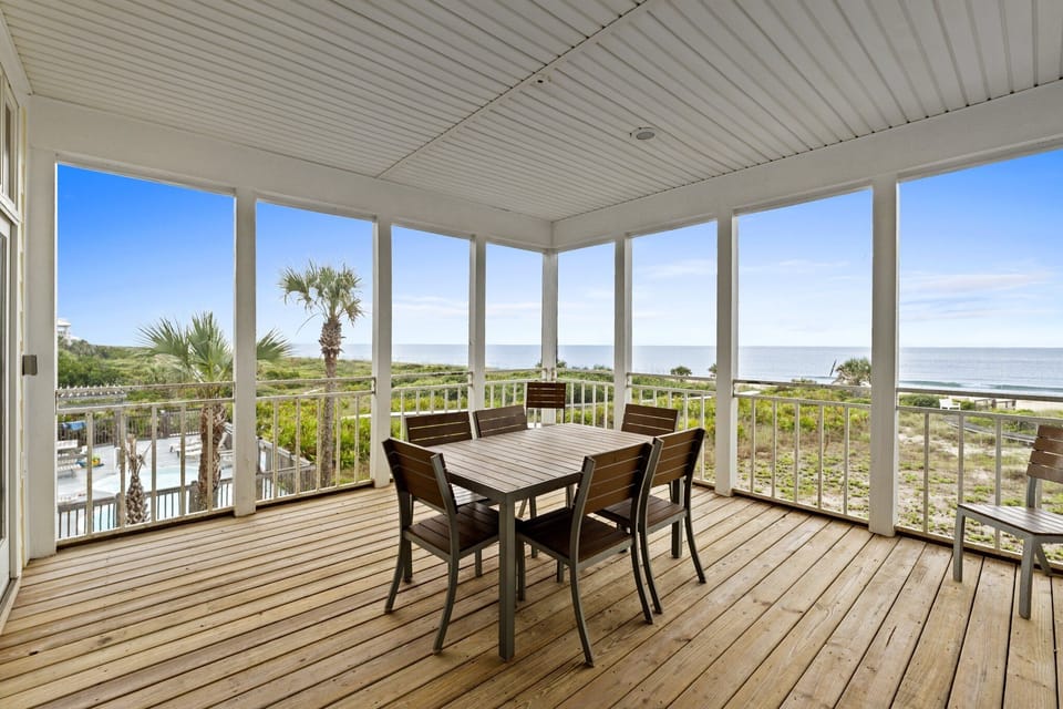screened in porch with dining 