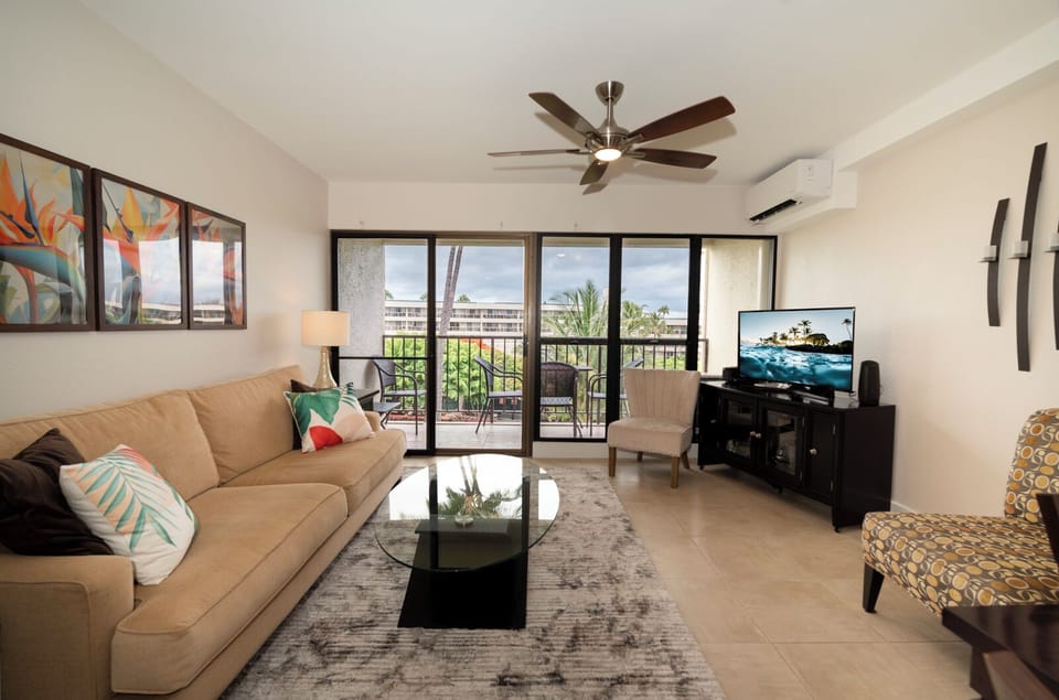 Comfy living room with split AC and both mountain and ocean views from the lanai