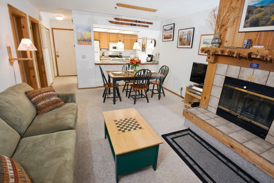 Enjoy quality time in a charming dining space, seamlessly connected to a well-equipped kitchen.