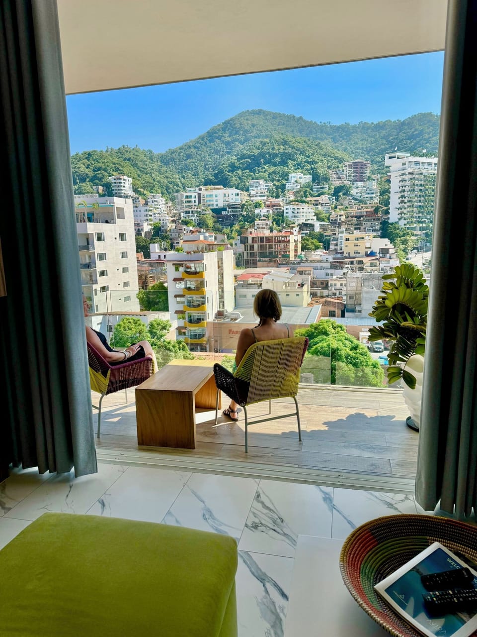 the view of the mountains and city is spectacular